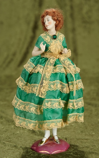 11" German porcelain half-doll with original pincushion and porcelain legs. $300/500