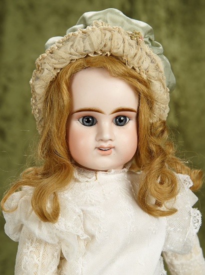 22" French bisque bebe by Denamur with paperweight eyes. $1200/1500
