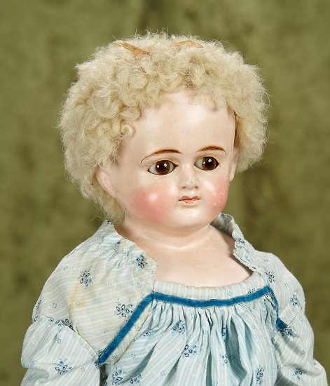 22" German paper mache doll with with original body and wig by Dressel.. $400/600