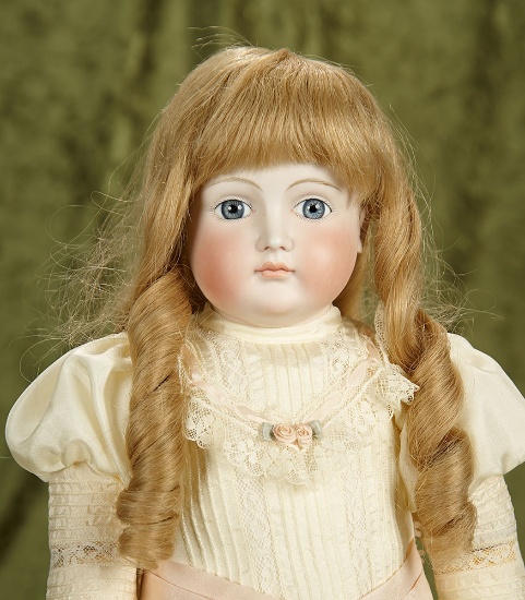 19" German bisque doll with closed mouth by Kestner, original early body. $900/1200
