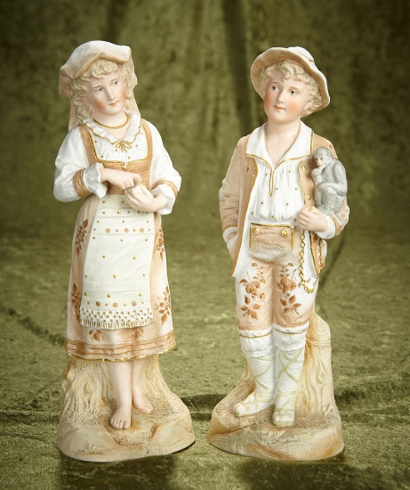 13" Pair, German all-bisque figurines by Gebruder Heubach. $300/400