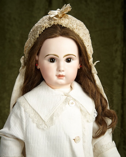 27" French bisque bebe by Emile Jumeau with brown eyes, original signed body. $3000/3400
