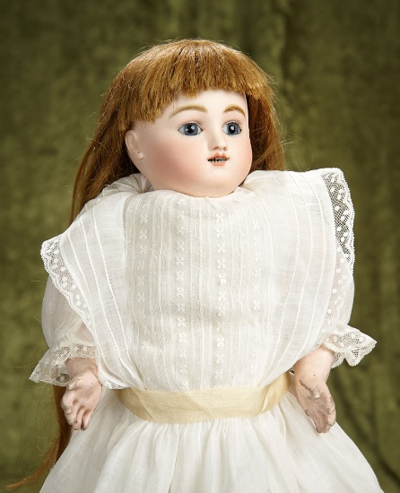 20" French bisque "Bebe Gigoteur" by Jules Steiner in antique dress. $1400/1700