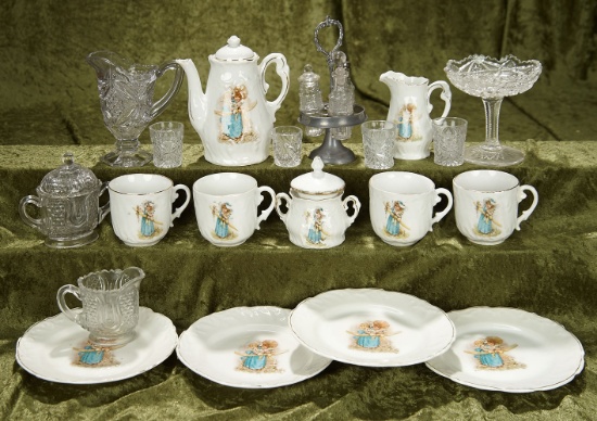 Doll-Size German porcelain tea service, Greenaway-like images, and various glassware. $400/500