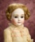 Petite German Bisque Child Doll Known as 