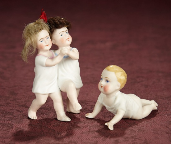 German All-Bisque Miniature Child Dolls with Sculpted Smocks 300/400