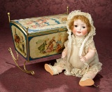 Rare German Lithographed Tinplate Candy Box in the Shape of Baby Cradle  800/1200