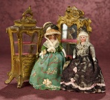 Two French Bronzed Miniature Cabinets and Pair of Dollhouse Dolls 900/1200