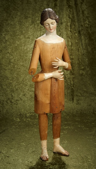 29" Early Continental wood doll with articulated elbows. $600/900
