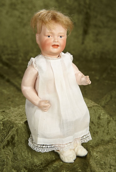 11" German Bisque Double-Faced Character by Gebruder Heubach. $600/800