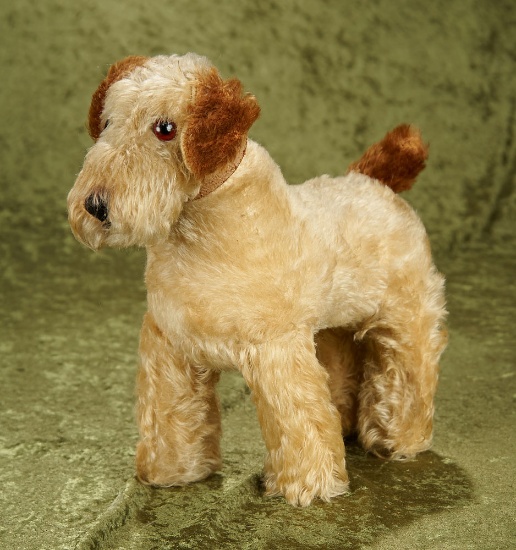 11" Vintage English mohair dog by Merrythought with glass eyes.