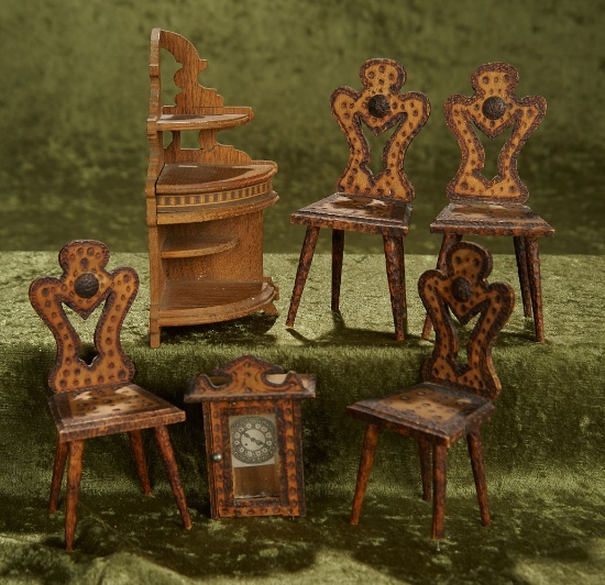 Six piece lot of German wooden dollhouse furniture with hammered design including four chairs.