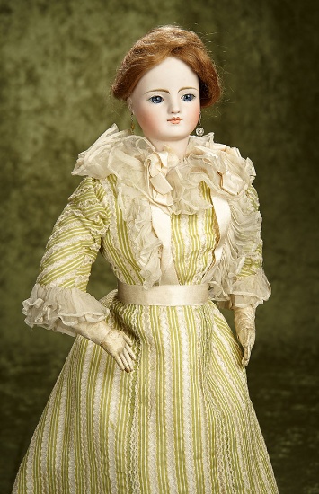21" Early bisque poupee with kid poupee body, lovely costume with couturier label. $1600/1900
