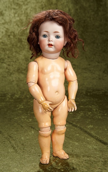 16" German bisque character,121,by Kammer and Reinhardt,side-hip jointed toddler body. $400/500