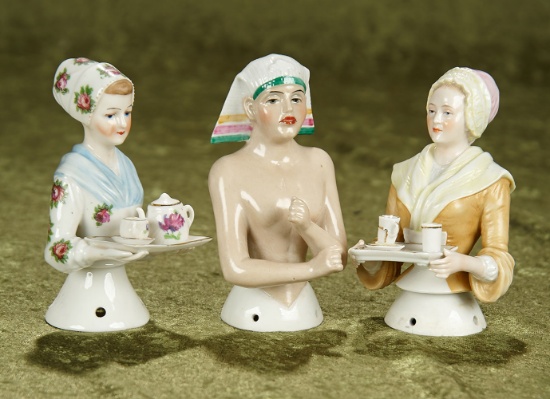 4"-5" Trio of German porcelain half-dolls, Egyptian lady, two Baker's Cocoa ladies. $800/1100