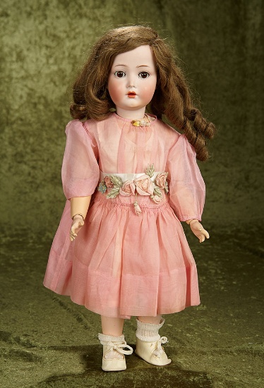 20" German bisque child doll by Cuno & Otto Dressel in lovely organdy costume. $600/800