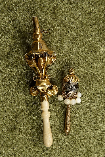 2 1/2"-5" Two, bells and whistles antique baby rattles. $500/600