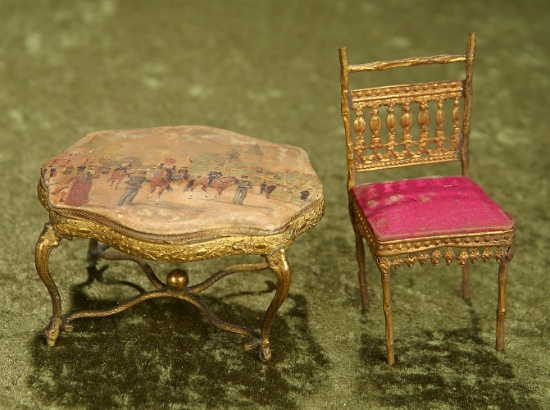 4"h. chair. French gilt metal dollhouse table with silk cover, and chair. $600/800