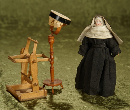 6" Bisque doll in nun's habit along with early spinning wheel and needlework frame. $400/600