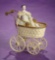 German Tin Doll Carriage by Maerklin with Early Porcelain Doll 400/500