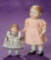 Two German All-Bisque Googly Dolls with Sculpted Hair in Side Coils 400/500