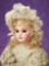 French Bisque Bebe by Emile Jumeau with Original Costume and Box 2600/3200
