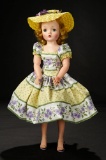 Cissy in Puffed Sleeve Yellow Dress with Printed Bands of Violets, 1957 500/700