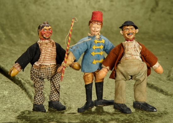 8"-9". Three wooden circus performers by Schoenhut, Two Hobos and a Lion Tamer.