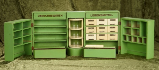 21"  German Mid-Century toy store with drawers, shelves and revolving showcase.