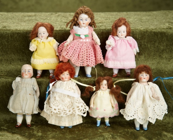 4-5"  Lot  of Seven German all-bisque girls with painted eyes.