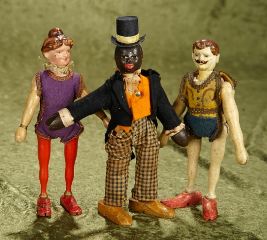 8" Three wooden circus performers by Schoenhut, two acrobats and and Black Dude.