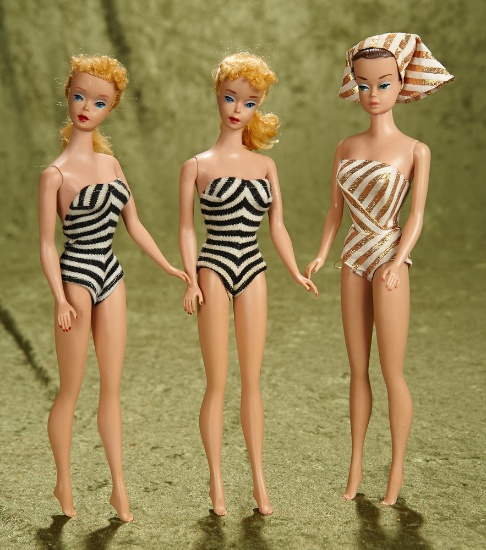 Pair of vintage blonde ponytail Barbies and a Fashion Barbie.