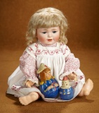 German Bisque Character, Model 612, by Bergmann with Toys 400/500