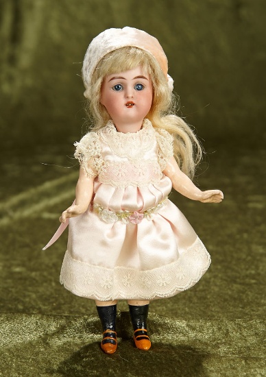 7" German bisque miniature flapper doll by Kammer and Reinhardt. $300/400