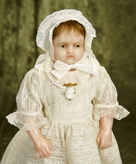 16" English poured wax child doll with original body, antique costume. $600/800