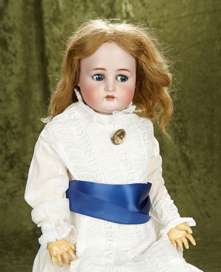 28" German bisque girl by K*R with excellent bisque and composition body with flirty eyes.