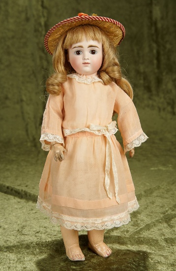 15" German bisque doll by Kestner with original signed body. $600/800