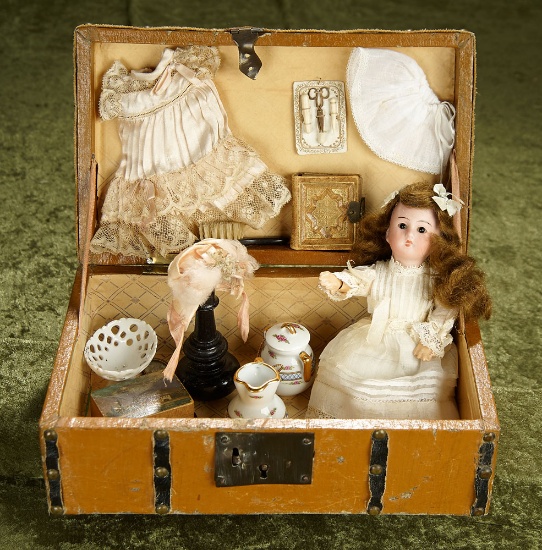 8" German bisque miniature doll in trunk with costumes and accessories. $500/700