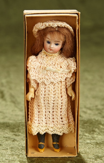 Charming 5" German bisque miniature doll, closed mouth, original factory costume, box. $200/300