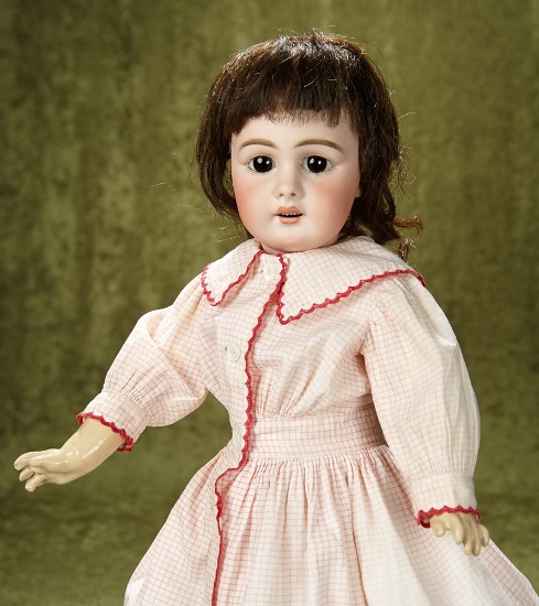 21" German bisque child doll, 939, by Simon and Halbig with pretty antique costume. $600/900
