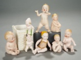 Seven German All-Bisque Miniature Babies by Hertwig 400/500