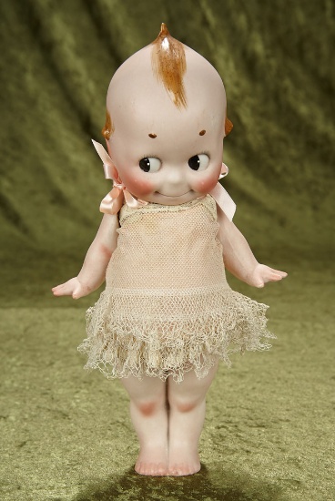 12" Grand-size German all-bisque standing Kewpie with jointed arms. $600/800