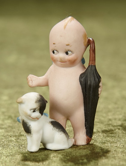 2 1/4" German all-bisque Kewpie Traveler with Doodledog. $400/500