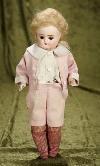 11" German bisque closed mouth doll with charming costume $400/500