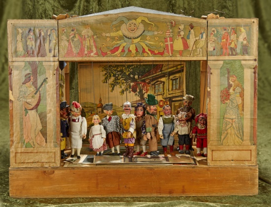 36" Antique Czechoslovakian toy theater with back drops and 40 puppets.