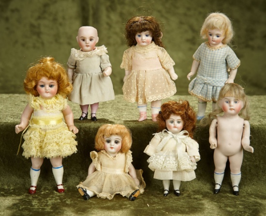 4"-6" Seven German all-bisque miniature dolls with painted shoes and socks