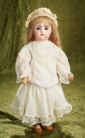 18" French bisque bebe by Gaultier, scroll mark, with closed mouth, original body. $2400/2800