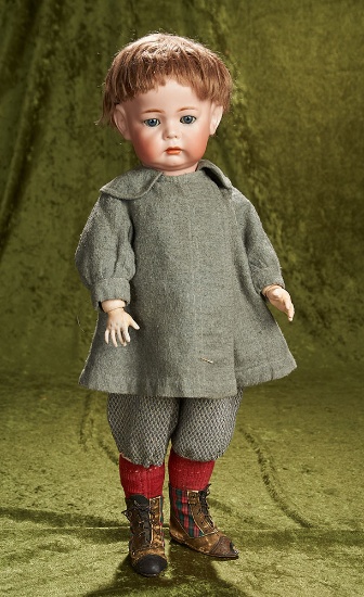 21" German bisque pouty toddler, "Phillip", model 115, by Kammer and Reinhardt. $2200/2500