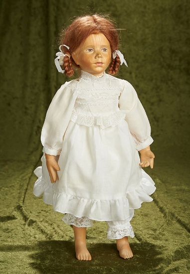 17" Carved wooden doll, painted features, carved wooden limbs, #5/40 limited edition. $600/800