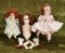 Three small all-bisque miniature dolls and Lenci doll in original costume.
